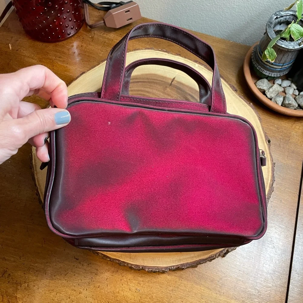 Deep burgundy iridescent handbag make up bag roomy storage opens wide zipper